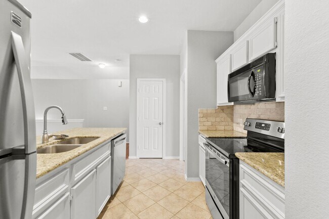 Building Photo - Stylish 2-Bed, 2-Bath Home with Unique Ups...