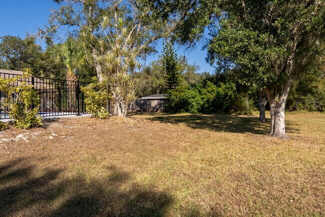Building Photo - Country-Style Sarasota Living on a Full Acre - Pool Home with Oversized Workshop — Move-In Ready Now