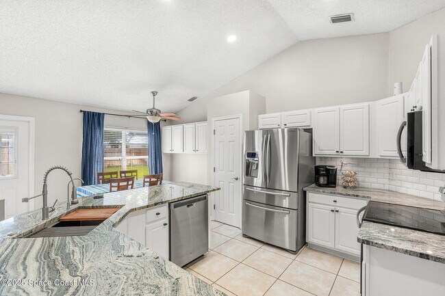 Building Photo - 413 Grenadier Ave NW