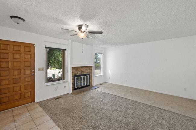 Building Photo - Close to Fort Carson and Cheyenne Mountain, 3 bedroom townhome with 2 car garage.