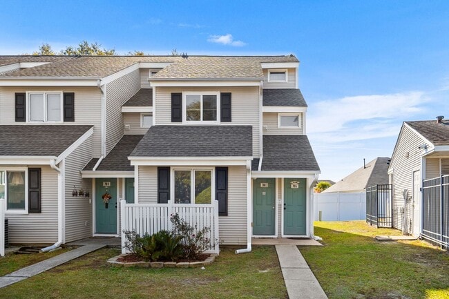 Building Photo - Now Allowing 1 small dog under 30Lbs - Spacious 2 bed/2 bath Deer Creek Villas-Surfside