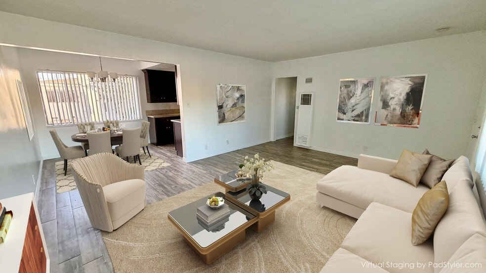 living room (Digitally Staged) - 444 W Regent St