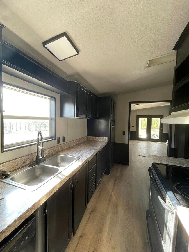 Building Photo - Multi-unit rental portfolio off Basin Rd