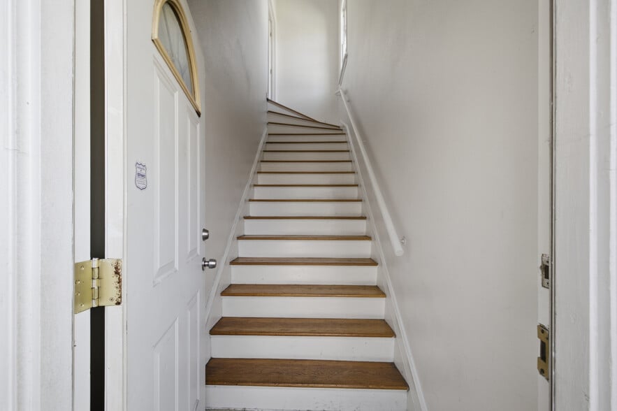 Staircase to upstairs apartment - 1097 S Orange Dr