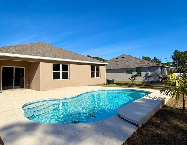 Building Photo - Palm Bay Pool Home Stunner!