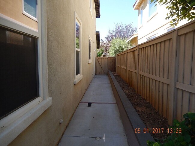 Building Photo - Two story, 2750 Sq Ft home with three car ...