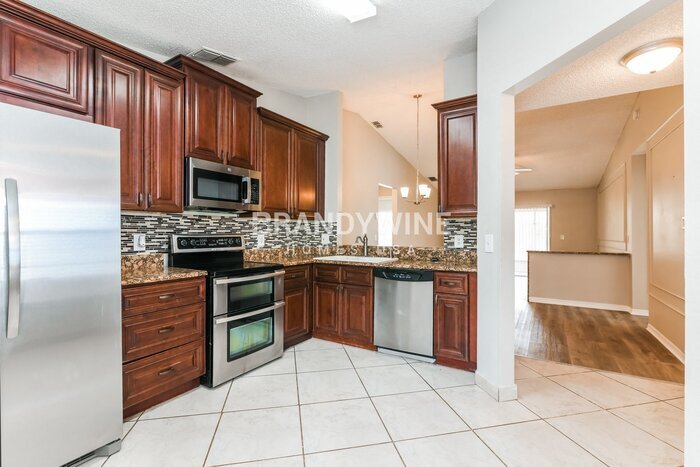 Building Photo - 7803 Myrtle Oak Ln