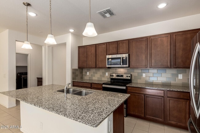 Building Photo - 7046 N 84th Dr