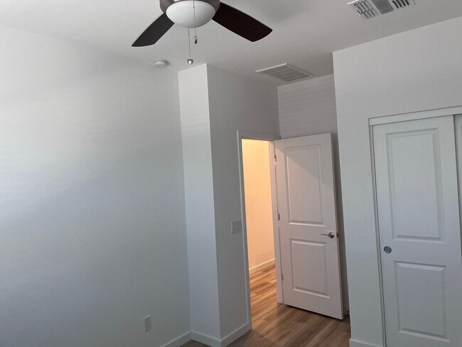 Building Photo - TOWN HOME WITH COMMUNITY POOL , GATED COMM...