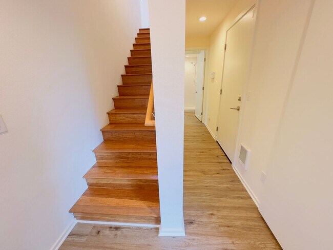 Building Photo - 3 Bedroom Central District Townhome w/ Garage, AC & Rooftop Deck