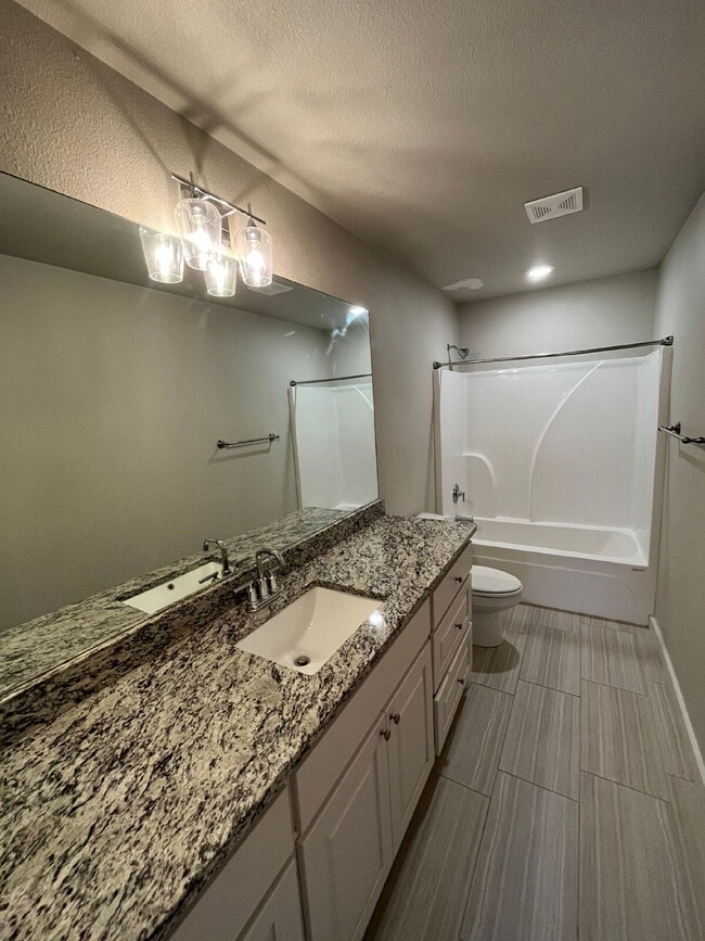 Building Photo - Stunning Duplex in Shallowater!
