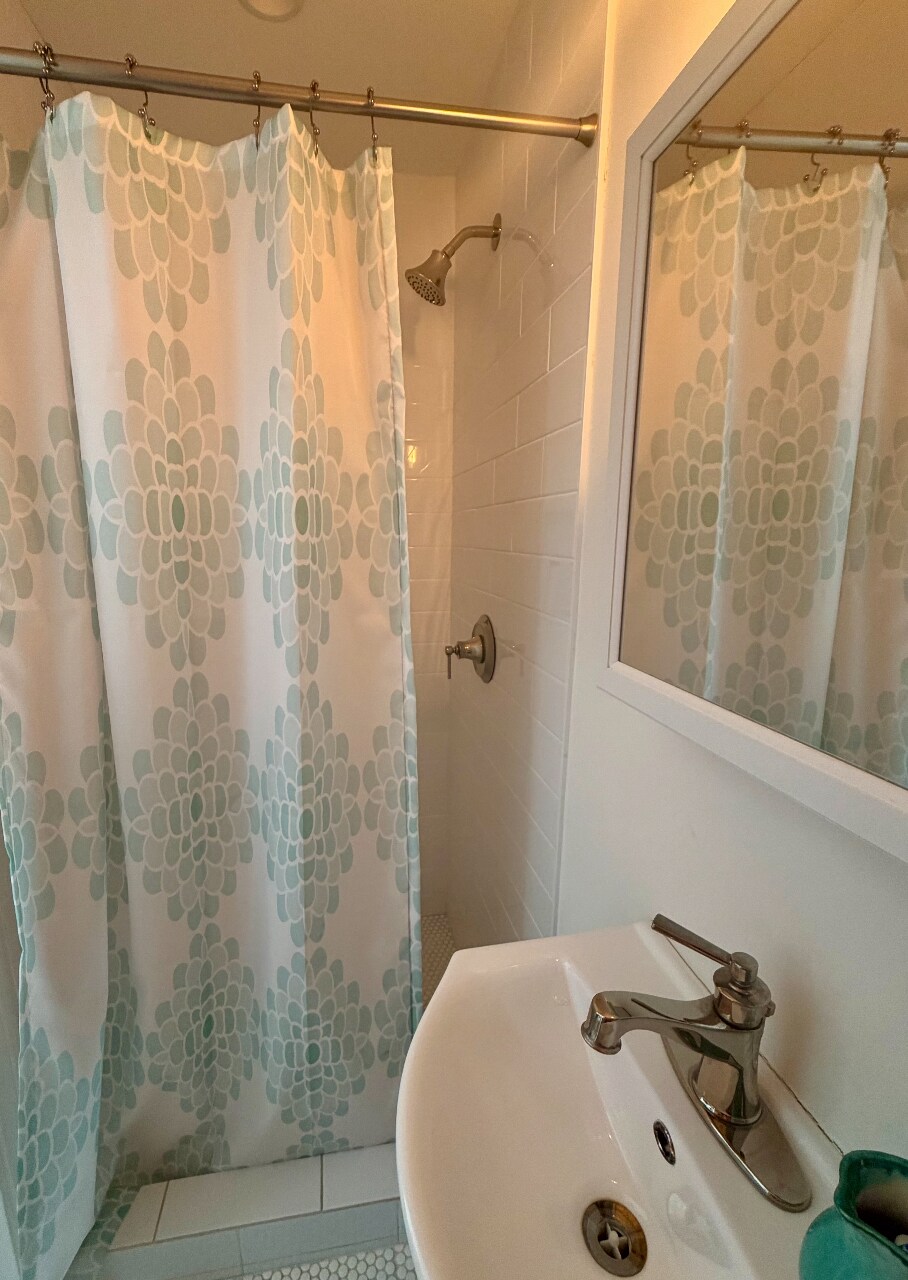 Newly renovated bathroom with shower - 2026 N Oxford Ave