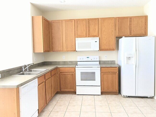 Building Photo - BEAUTIFUL LAKEFRONT SINGLE FAMILY HOME