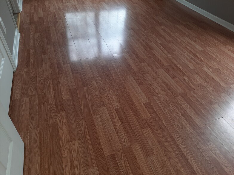 Master Bedroom flooring - 1216 Lipps Ln