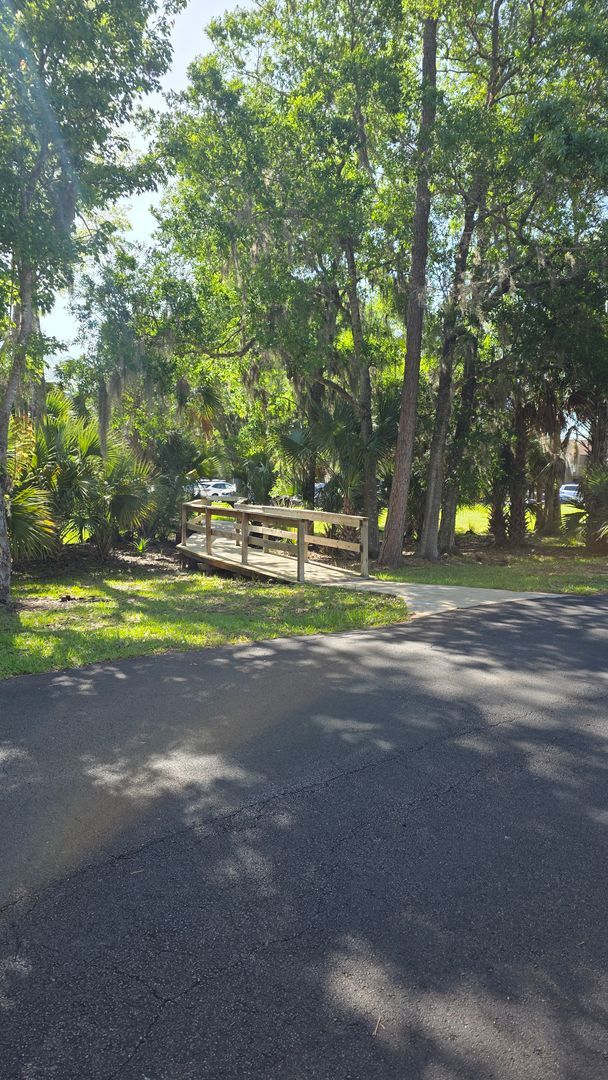 Building Photo - Beautiful Pond Front 2 Bedroom 2 Bath Townhome in the Wood Haven Community