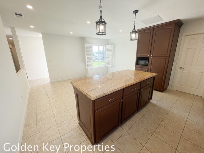 Building Photo - Nicely renovated corner property with a pool!