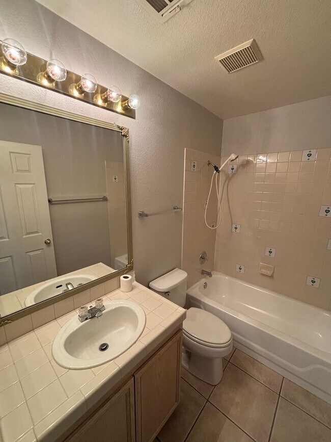 Building Photo - Gated Green Valley Ranch Townhome | 2 Bed | 2.5 Bath | 2-Car Garage