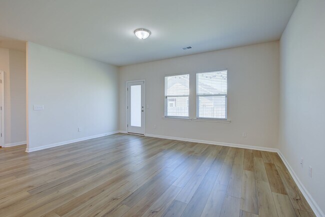 Building Photo - Spacious 4BR Rental with Stunning Kitchen & Covered Patio