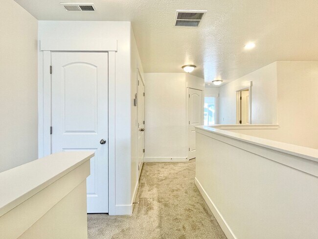 Building Photo - Beautiful Poolside Townhome at The Exchange!