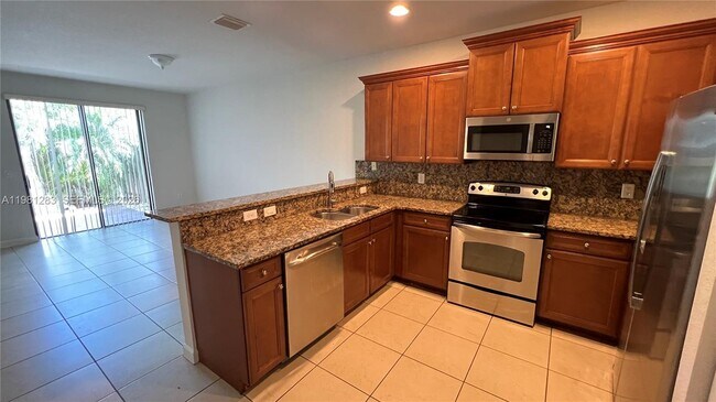 Building Photo - 8899 NW 98th Ave