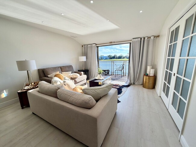 Building Photo - Bright & Modern 2-Bed Condo Overlooking Pond and Golf Course in Saddlebrook!