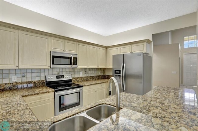Building Photo - 6455 NW 78th Dr