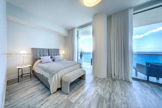 Building Photo - 10203 Collins Ave