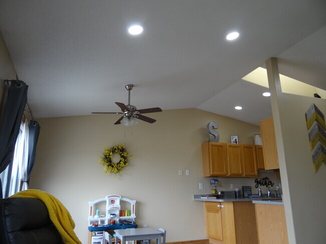 Beautiful open floorplan with skylight providing natural light - 998 38 1/2 Ave W