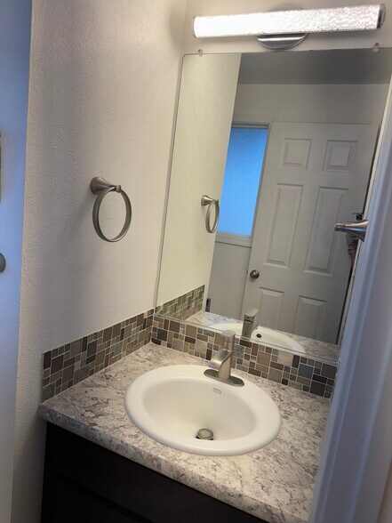 Different view of half bath. - 15320 NE 31st St