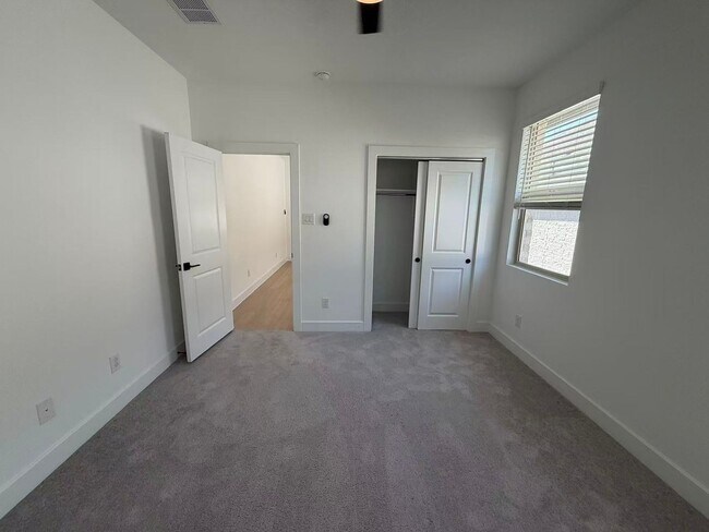 Building Photo - Move-in ready and like-new! Washer, dryer, and refrigerator Included.