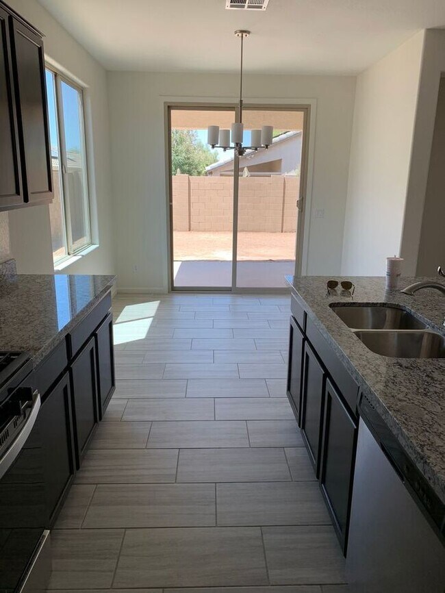 Building Photo - This stunning 4-bedroom, 2-bathroom home l...
