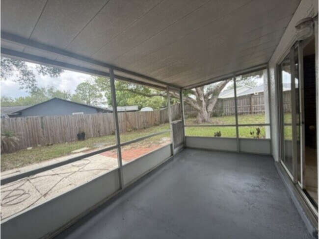 Building Photo - Large 4 Bedroom with Family Room, Fireplace, &amp; Screen Porch!