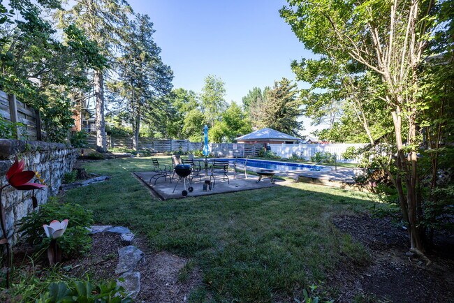 Building Photo - Stylish Downtown Apartment with a Private Oasis and Pool Retreat!