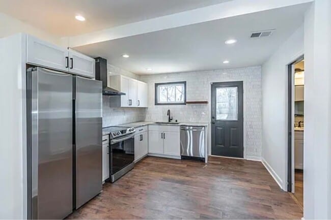 Building Photo - Fully Renovated 2BR/2BA with Garage – Walk to West Sixth & Legacy Trail