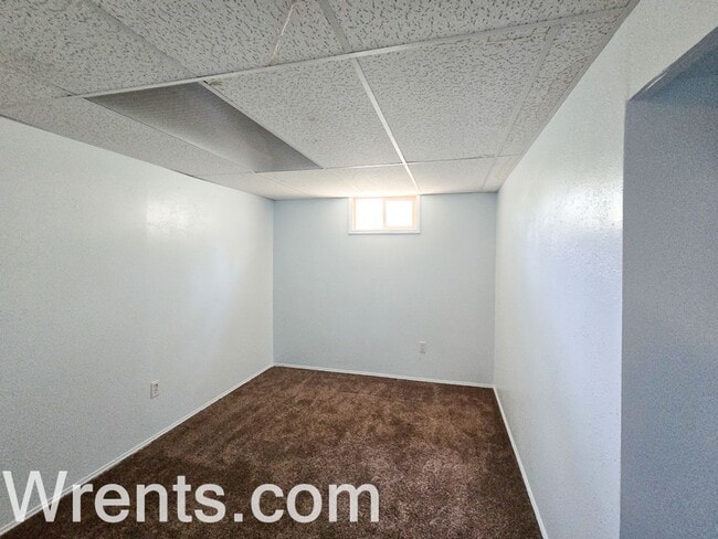 Building Photo - charming 2-bedroom, 1-bathroom ranch-style...
