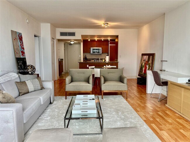 Building Photo - 10275 Collins Ave