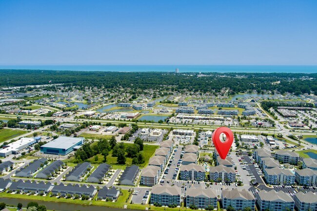 Building Photo - The Villages at Queens Harbour II