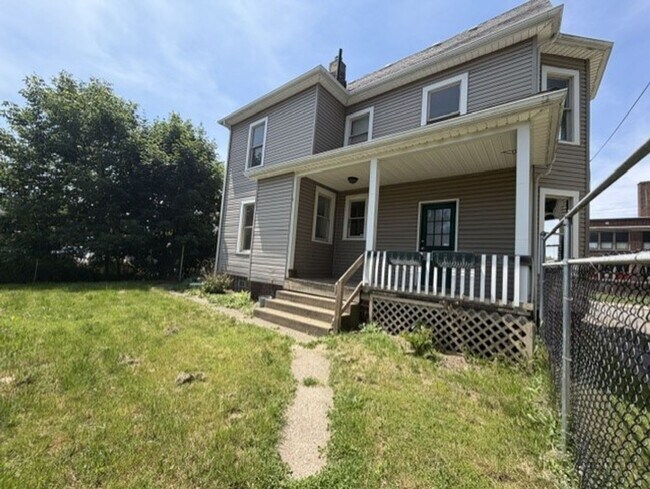 Building Photo - Spacious 4-Bedroom Home with 2 Full Baths, Central A/C & Fenced Yard!
