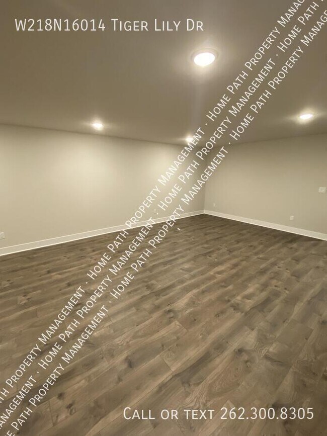Building Photo - W218N16014 Tiger Lily Dr