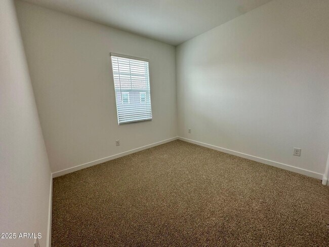 Building Photo - 8149 E Petunia Ave