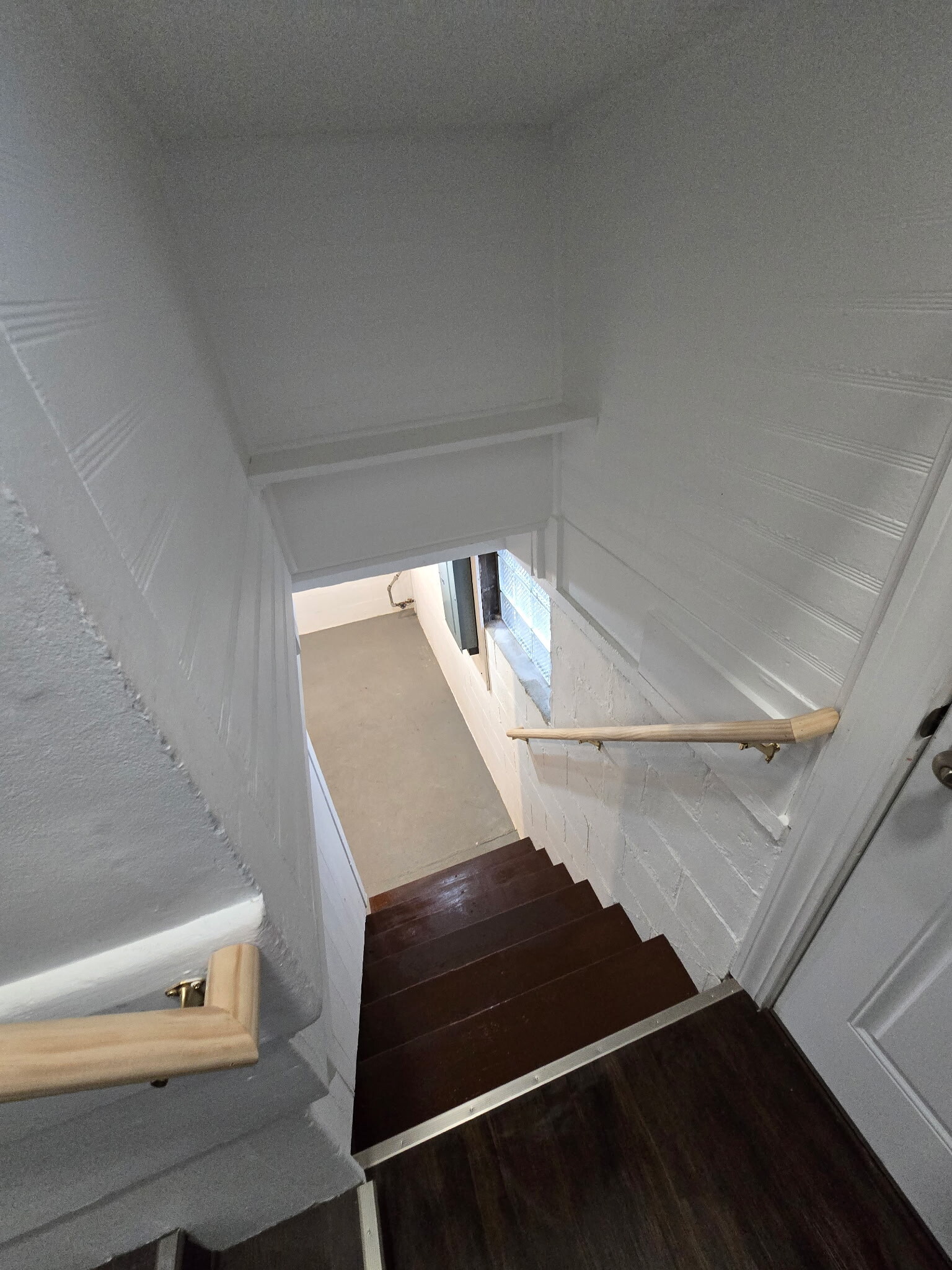Basement stairs. Back door out of view, to the right - 1473 Montgomery Ave