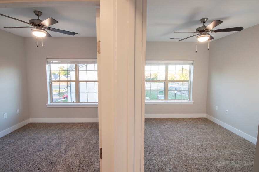 two guest bedrooms upstairs - 230 Signature Pl