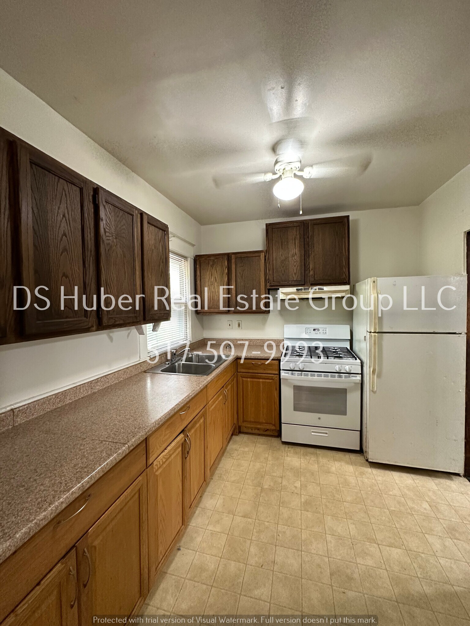 Kitchen, entry to the kitchen is to the right of the fridge - 151 Garden St
