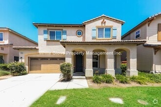 Building Photo - Beautiful Spanish Style 3 Bedroom Plus Lof...