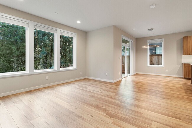 Building Photo - Like New!  Upgraded finishes Throughout!  ...