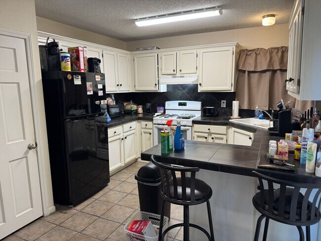 Building Photo - Welcome home to 10022 Windburn Trail!