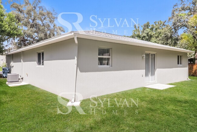 Building Photo - This charming home is ready for your personal touch!