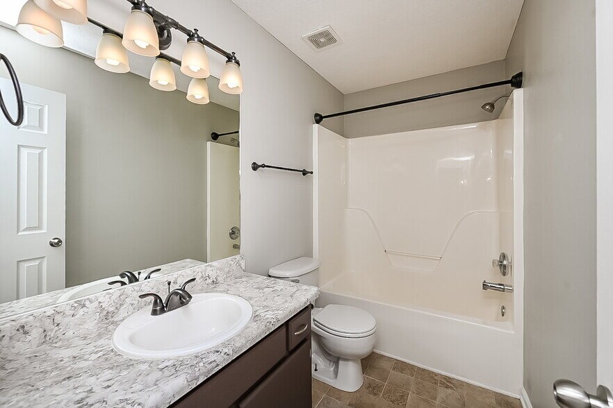 Building Photo - 715 Whispering Breeze