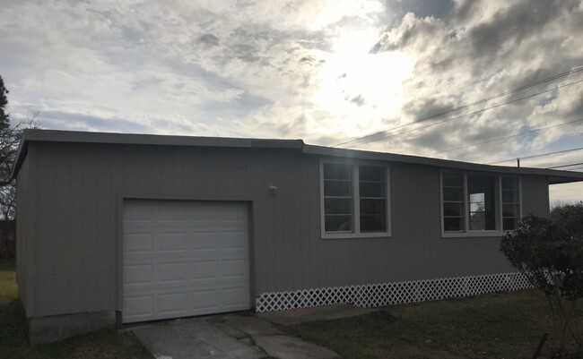 New garage door with opener - 6720 FM 1765