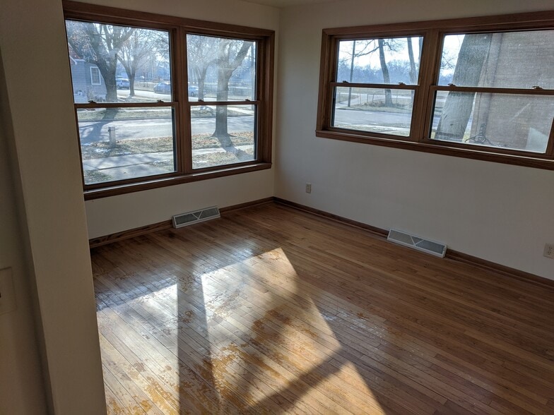 A view of the living room, freshly mopped. - 2306 Hoard Street